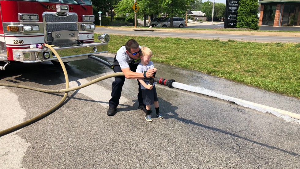 Child Spraying Fire Hose - Bowling Green Fire Department